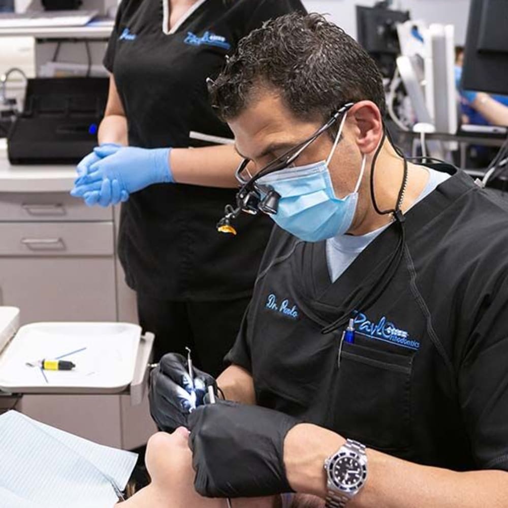 Dr. Pavlo works on a patient at Pavlo Orthodontics.